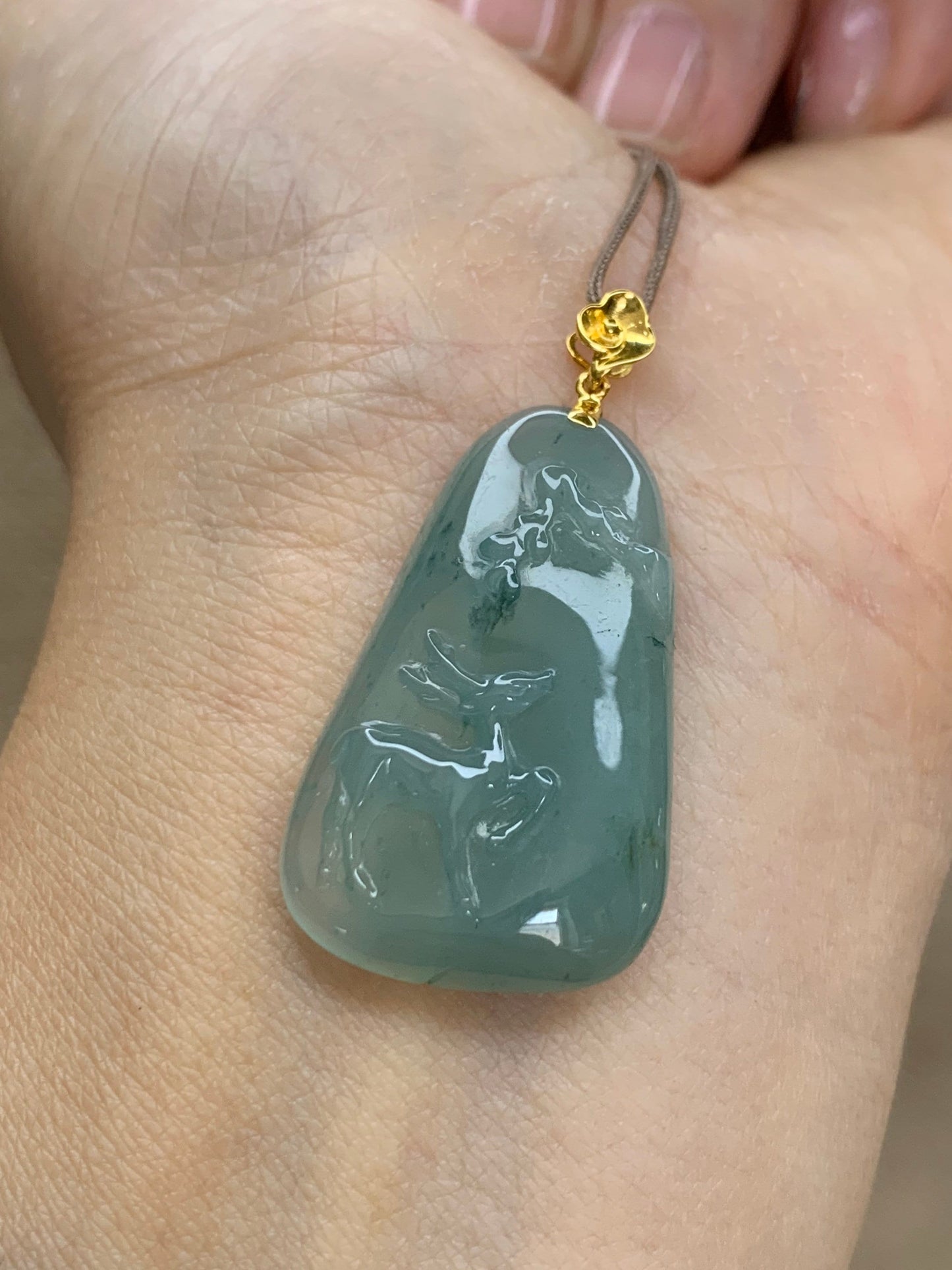 Certified Natural Burmese grade A Icy Translucent Green Jadeite Deer Engraved Pendant with 18K Yellow Gold Bail 天然缅甸翡翠正冰满绿飘花鹿牌镶嵌吊坠