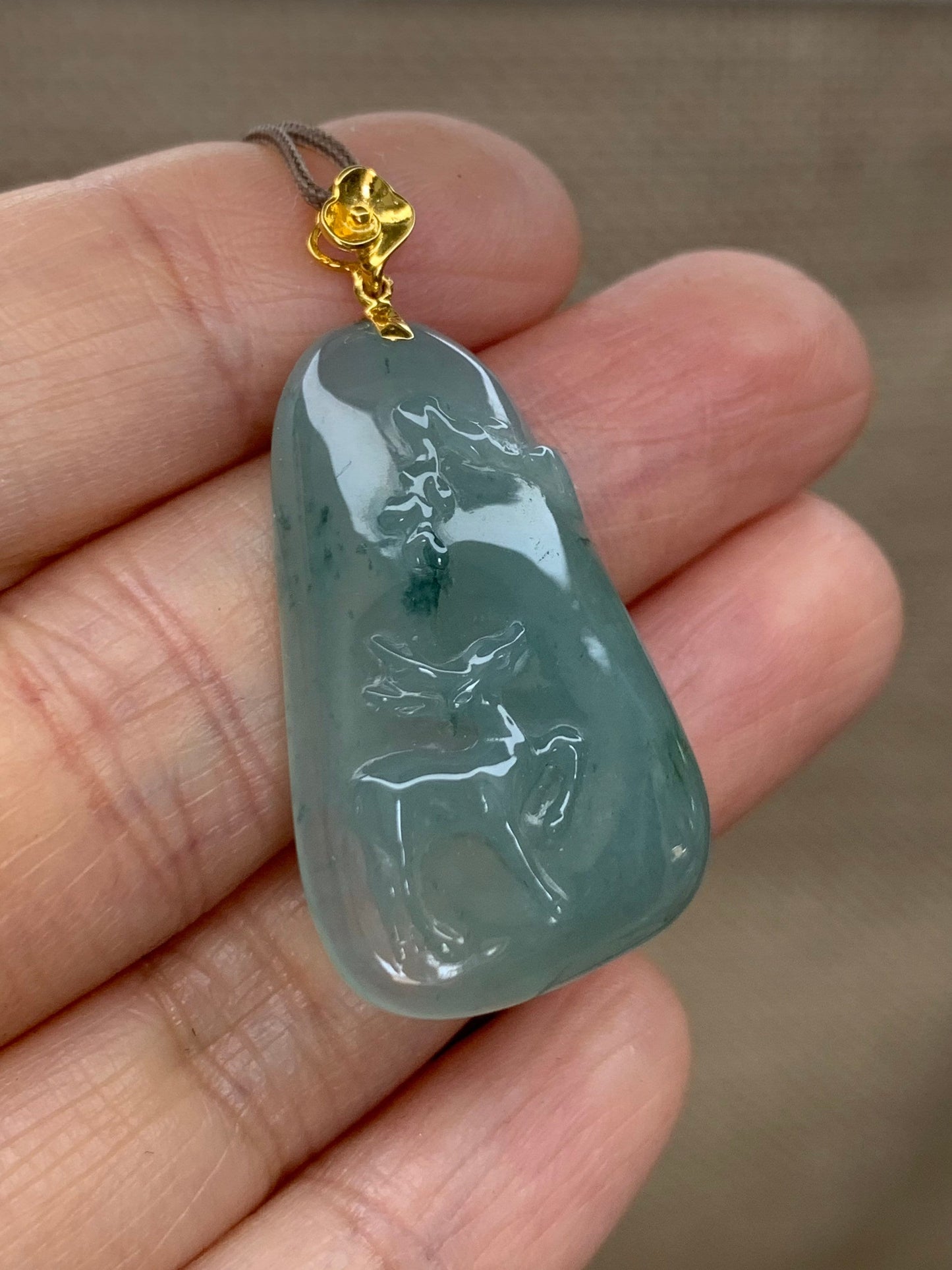 Certified Natural Burmese grade A Icy Translucent Green Jadeite Deer Engraved Pendant with 18K Yellow Gold Bail 天然缅甸翡翠正冰满绿飘花鹿牌镶嵌吊坠