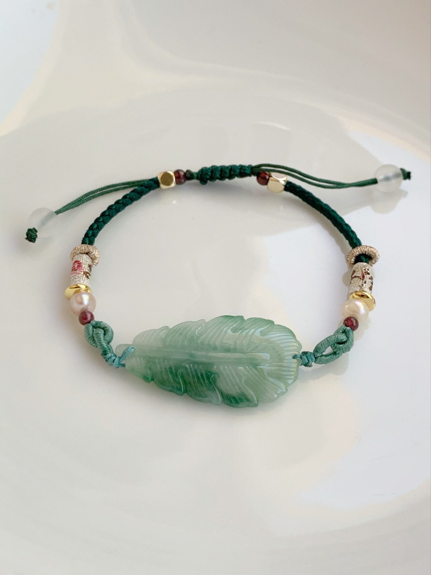 Natural Burmese Icy Translucent Light Green Jadeite w/ Intense Green Marbling Carved Feather Rope Bracelet 6.5” Adjustable 天然缅甸糯冰晴底飘花翡翠羽毛手绳