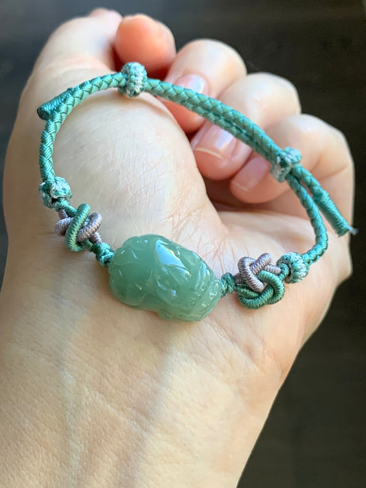 Natural Burmese Icy Translucent Gelatinous Pea Green Colored Jadeite Carved Pixiu Braided Rope Bracelet Adjustable up to 8” 天然缅甸冰胶豆绿翡翠貔貅手绳